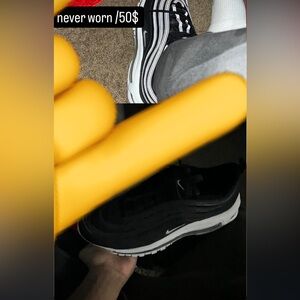 Nike airmags black and white with reflecting strip.